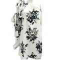 Vestido asimétrico floral blanco y negro con moños laterales