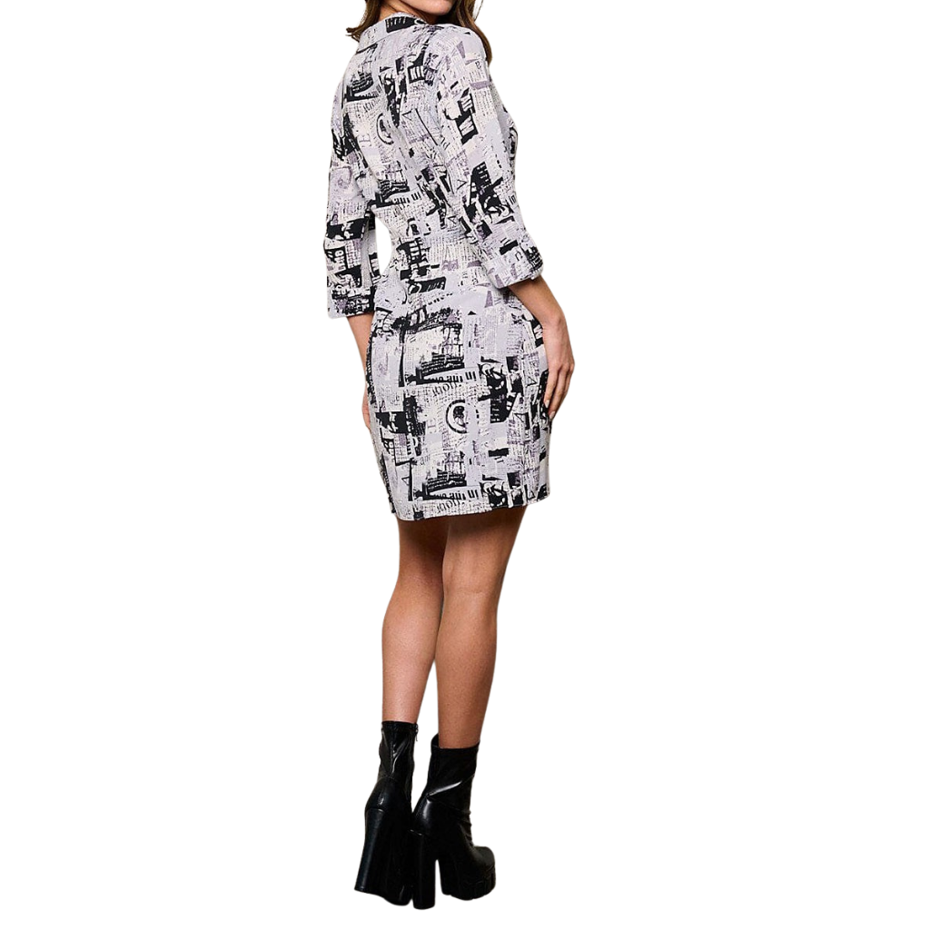 Vestido camisero cruzado estampado periódico blanco y negro
