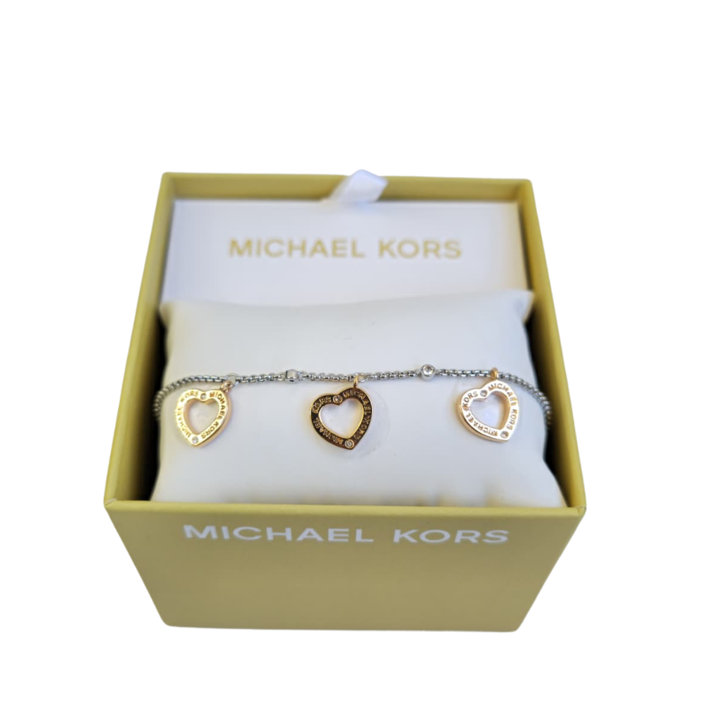 Pulsera Michael Kors plateada con dijes de corazón dorados