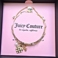 Pulsera Juicy Couture Dorada con Dijes Corazón y Perla | Original en Caja Rosa