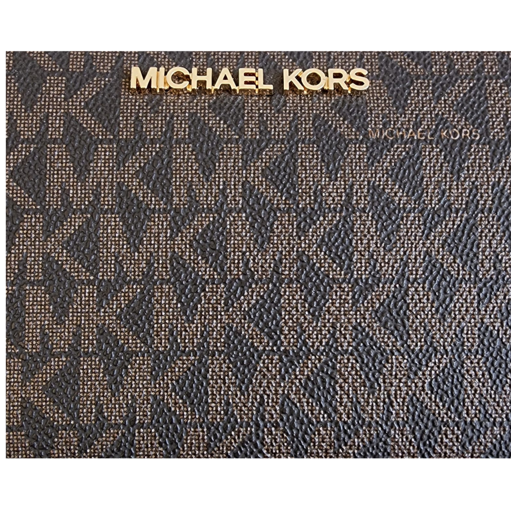 Cartera Michael Kors original monograma MK con cierre tipo wristlet