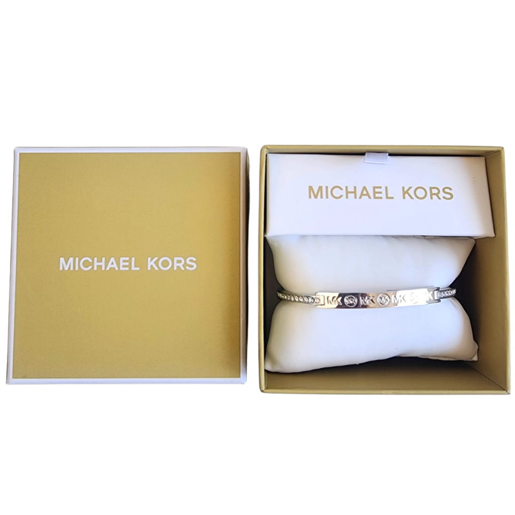 Pulsera Michael Kors plateada rígida con placa MK y cristales