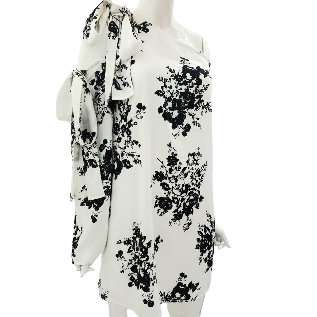 Vestido asimétrico floral blanco y negro con moños laterales
