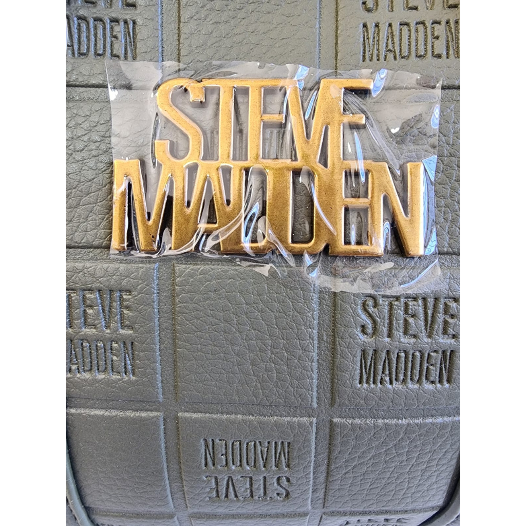 Bolsa Steve Madden verde con monedero corazón y correa ajustable