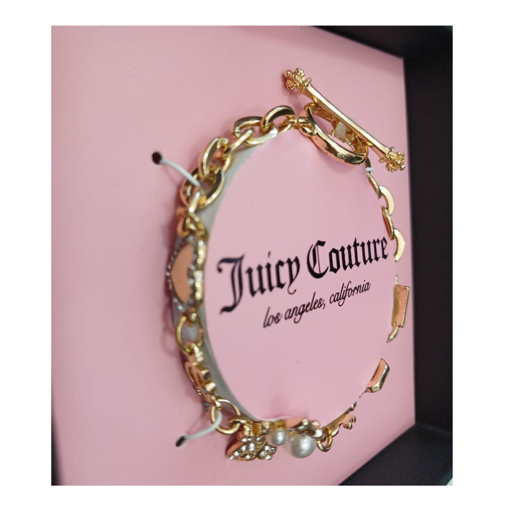 Pulsera Juicy Couture dorada con dije mariposa y perla
