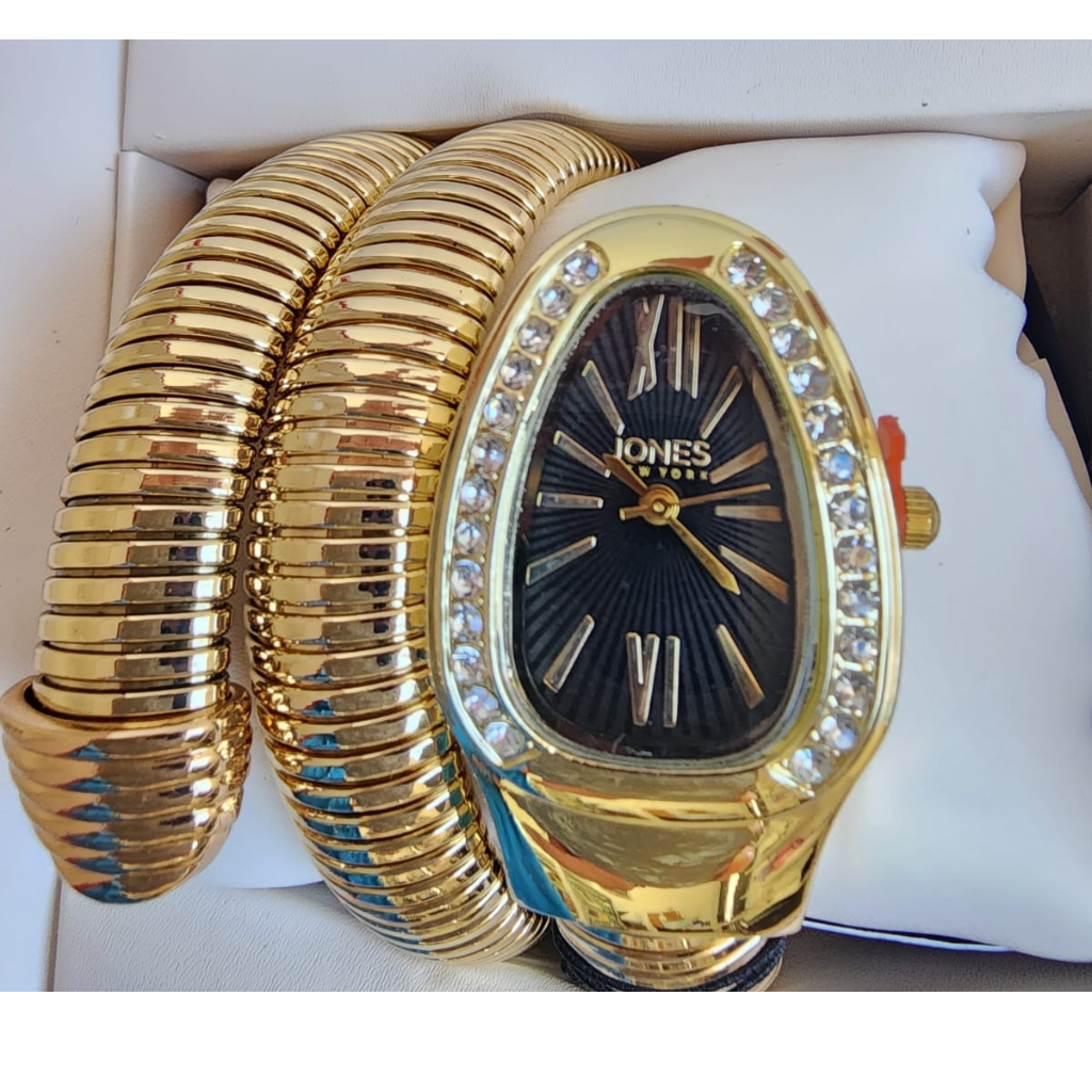 Reloj Jones New York dorado con pulsera tipo brazalete y cristales