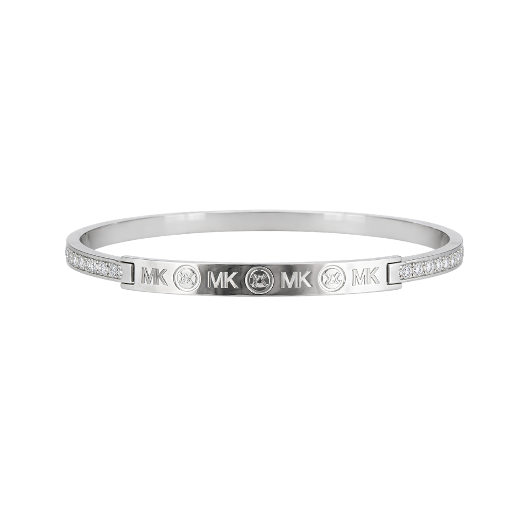 Pulsera Michael Kors plateada rígida con placa MK y cristales